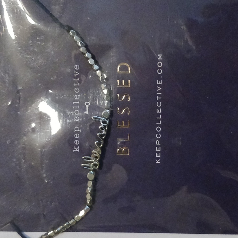 Keep Collective Blessed pulley bracelet..w lock & key mini charms on tassles...